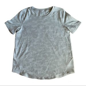 Gray and white camo lululemon shirt. Size 4
